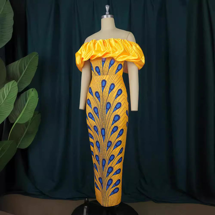 Dame Elegant aftenkjole med skulderfri design og voluminiøs flæsekant Skovae
