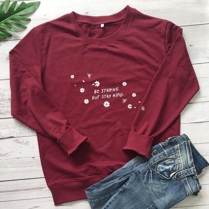 Kvinders sweatshirt med inspirerende budskab og blomstermotiv Stilla