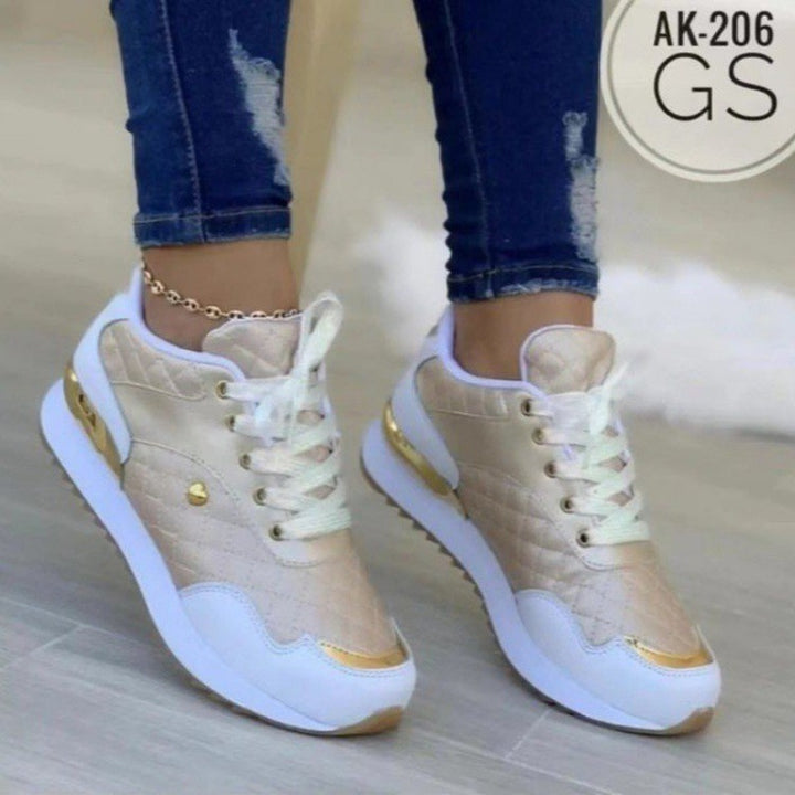 Dame sporty sneakers med elegant guldaccent og åndbart overmateriale Stilla