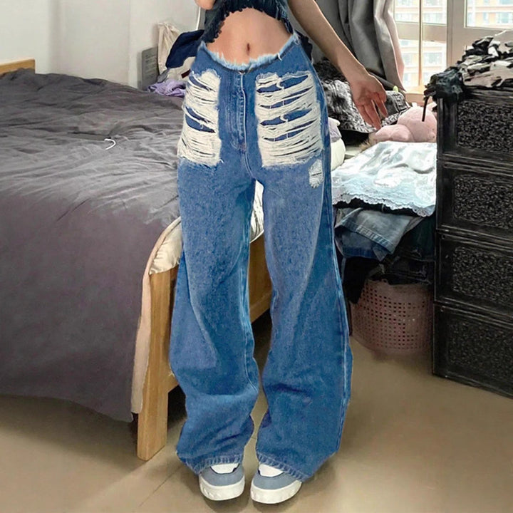 Dame brede jeans med iøjnefaldende rivdetaljer og afslappet snit Stilla