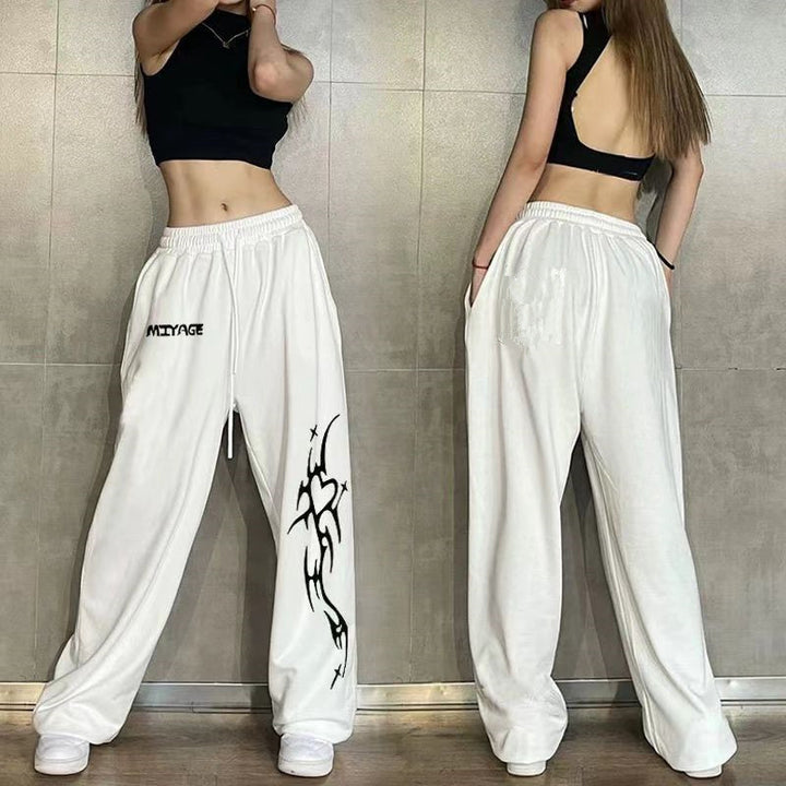 Kvinders afslappede fritidspants med bred pasform og iøjnefaldende grafisk design Skovae
