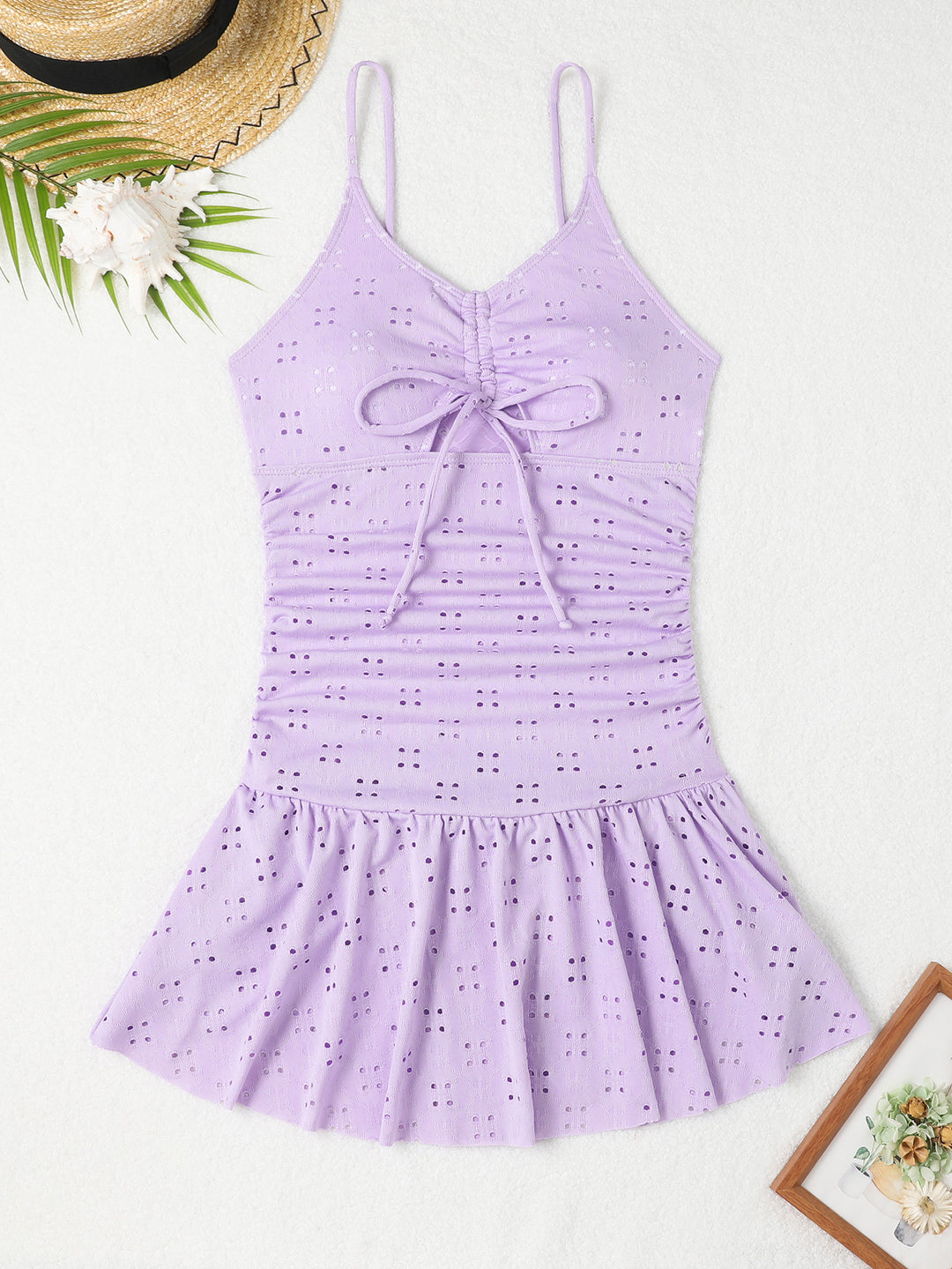 Dame badedragt med elegant rufflesdesign og delikate cut-out detaljer Stilla
