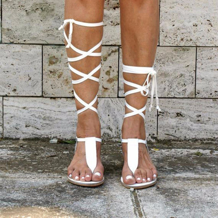 Dame gladiatorsandaler med elegante, snoede remme og komfortabelt fodbede Stilla