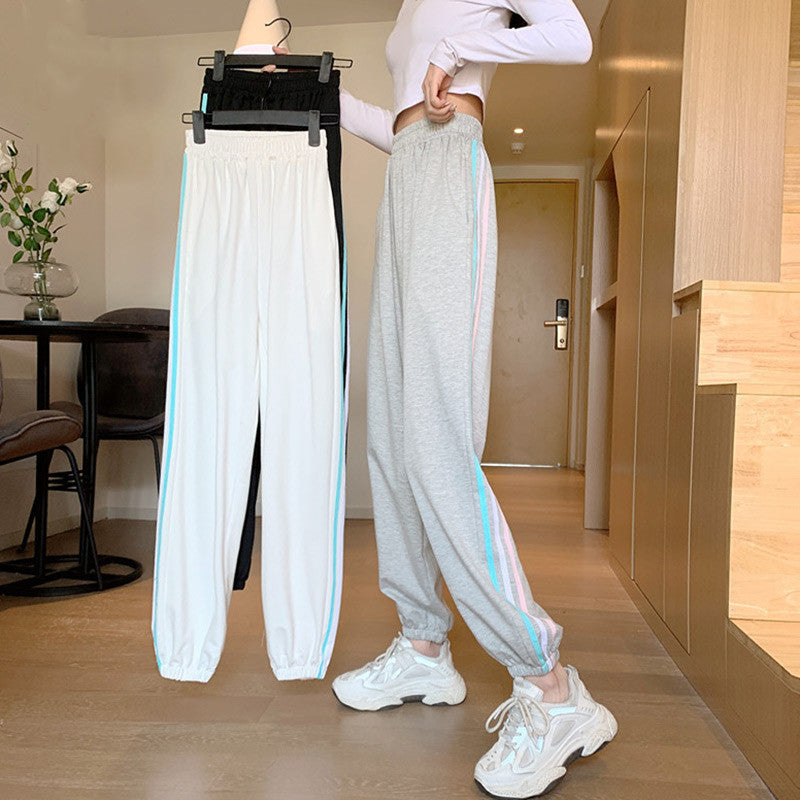 Dame sporty joggingbukser med stilfulde sideindsatser Stilla