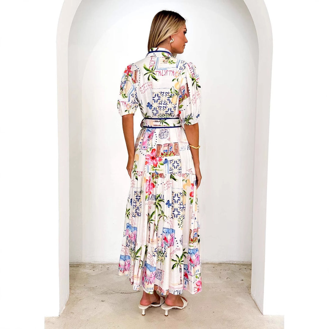 Dame maxikjole med farverig blomsterprint og et elegant bælte Stilla