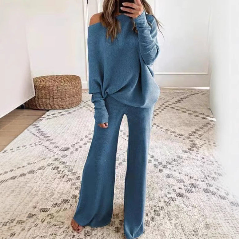 Dame strikdragt med afslappet pasform og off-shoulder design Stilla