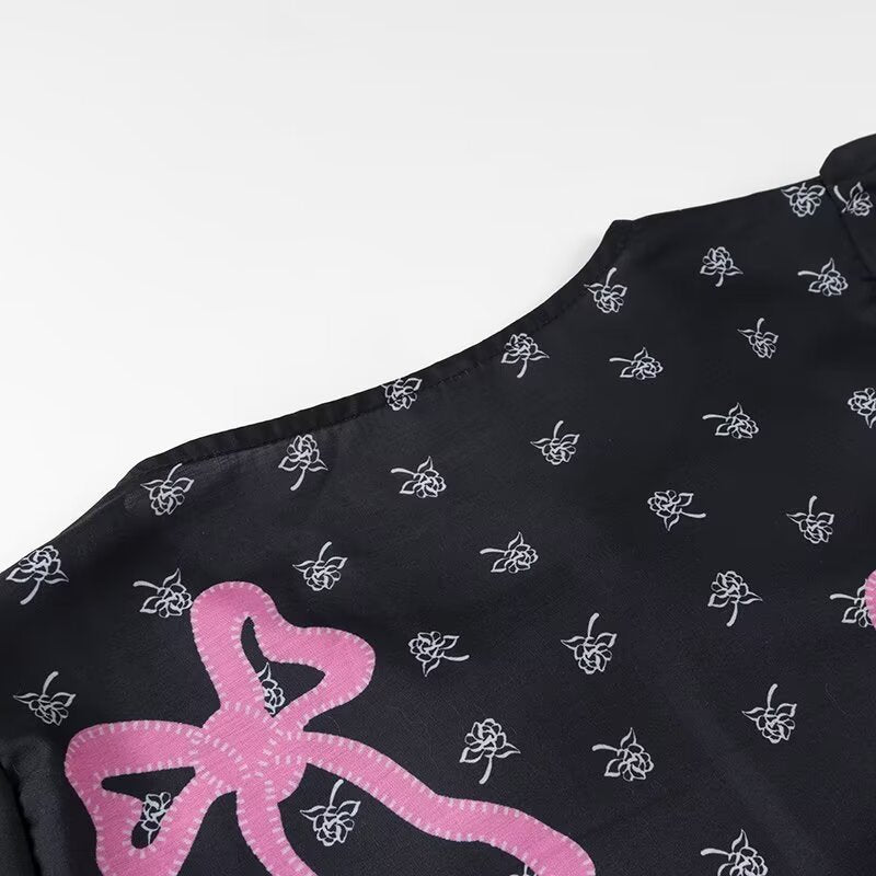 Damebluse med legende sløjfedesign og raffinerede detaljer Stilla