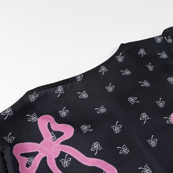 Damebluse med legende sløjfedesign og raffinerede detaljer Stilla
