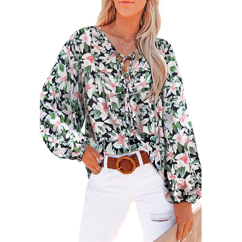 Damebluse med blomsterdesign og voluminøse ærmer Stilla