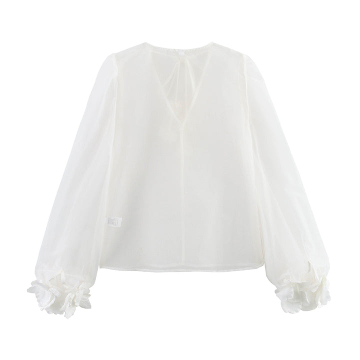 Femme Elegante Transparent Bluse med Puffærmer og Florale Accenter Stilla