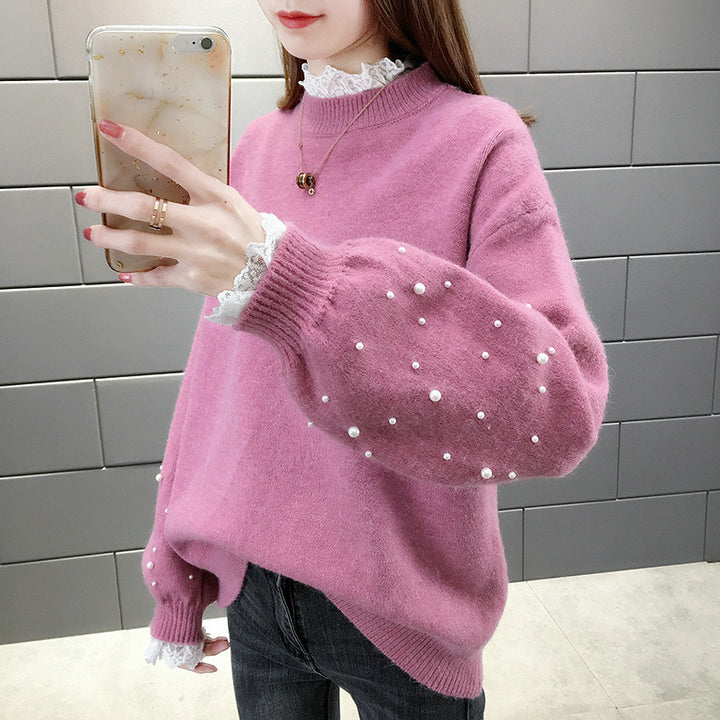 Dame trendy strikpullover med perledetaljer og voluminøse ærmer Stilla