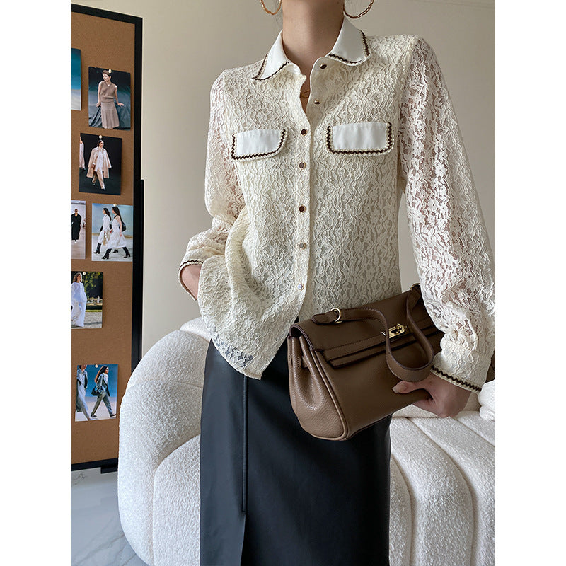 Kvindernes elegante bluse i blonder med kontrastdetaljer Stilla