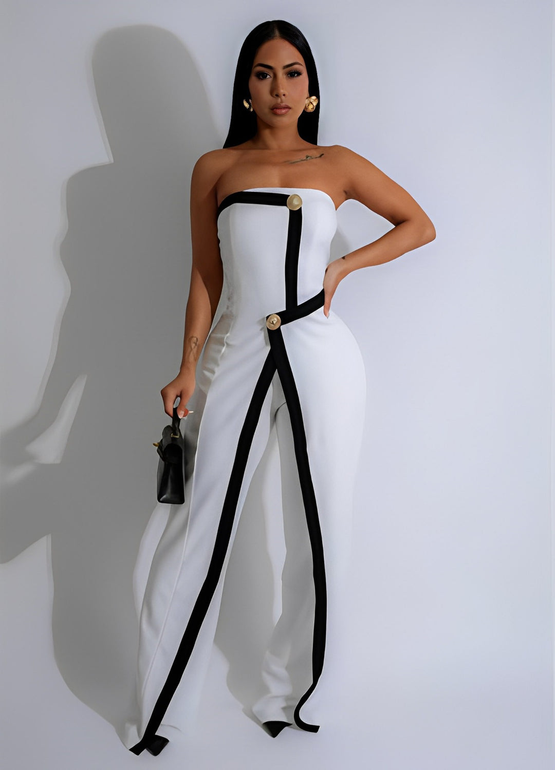 Dame-jumpsuit med elegant bustier-overdel og kontrasterende kantdetaljer Skovae