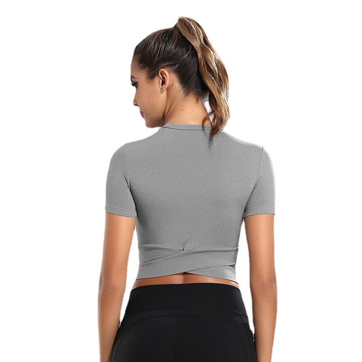 Dame kortærmet træning crop top med innovativ indpakningsoptik Skovae