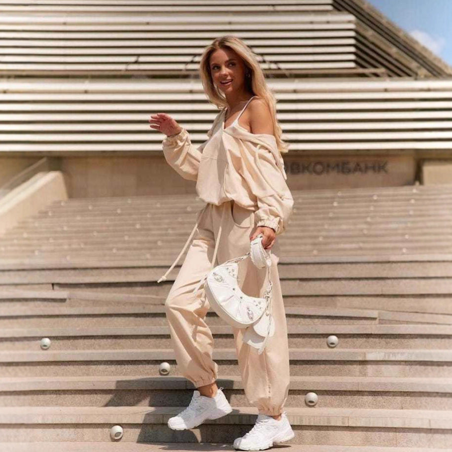Kvinders casual jumpsuit med dyb V-hals og praktiske lommer