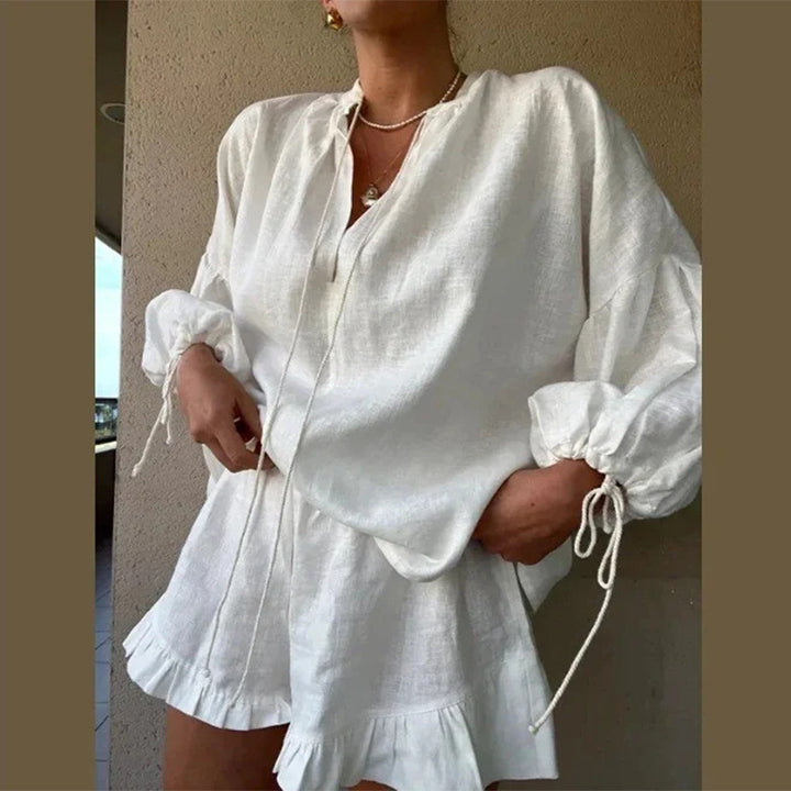 Damebluse med elegante sløjfebånd og voluminøse ærmer Stilla