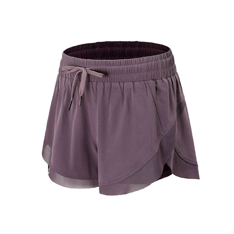 Dame Åndbare Træningsshorts med fleksibel Talje og sidelommer Stilla
