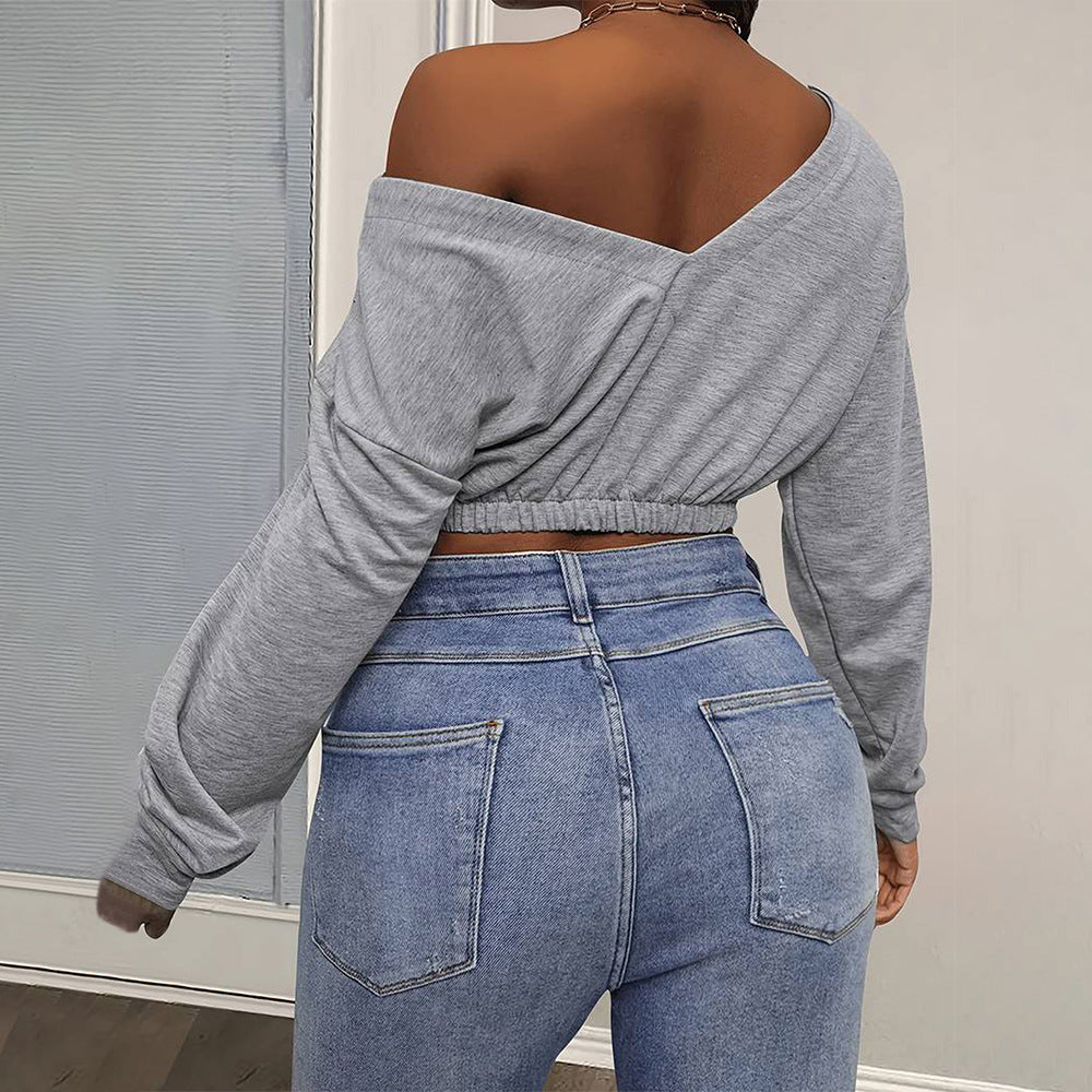 Kvindernes afslappede crop top med off-shoulder design og tætsiddende kant Stilla