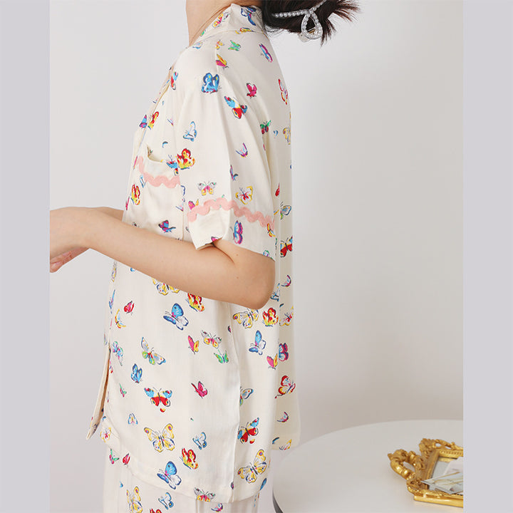 Dame kortærmet pyjamassæt med farverigt sommerfugledesign og komfortabel pasform Stilla