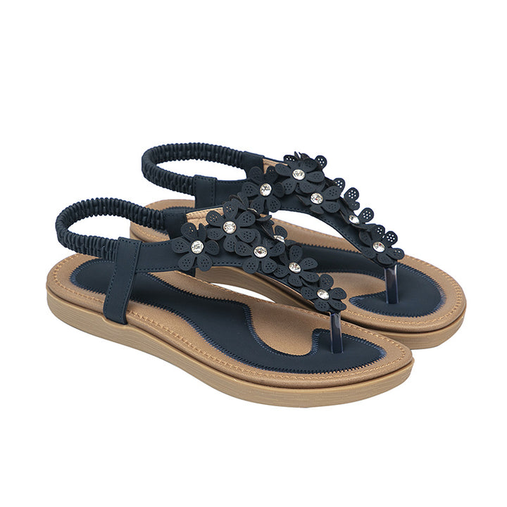 Dame sandaler med blomstret design og glitrende detaljer Stilla