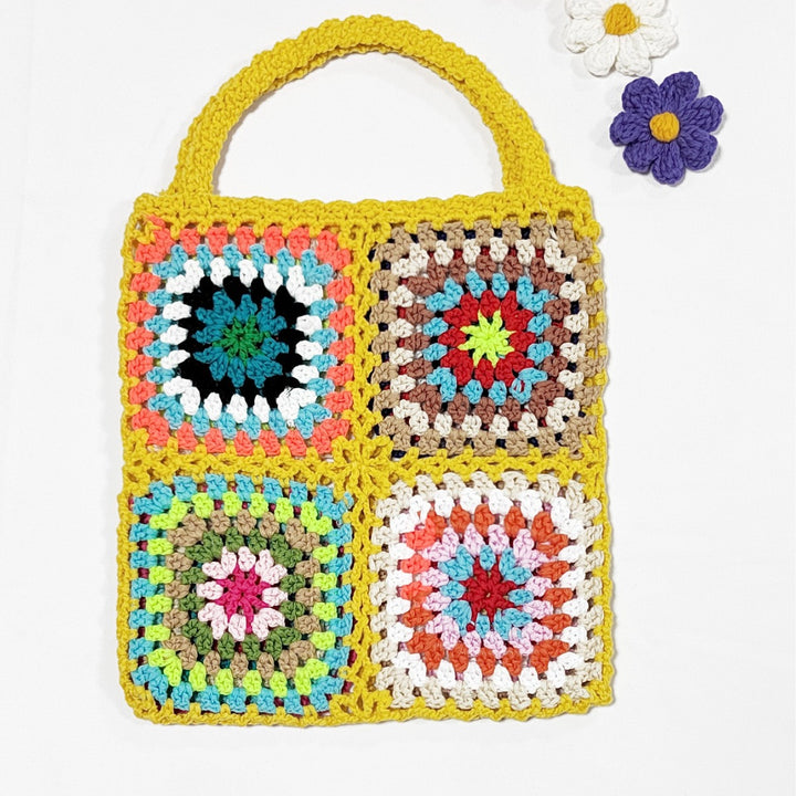 Dame hækle håndtaske i det karakteristiske granny square design Stilla