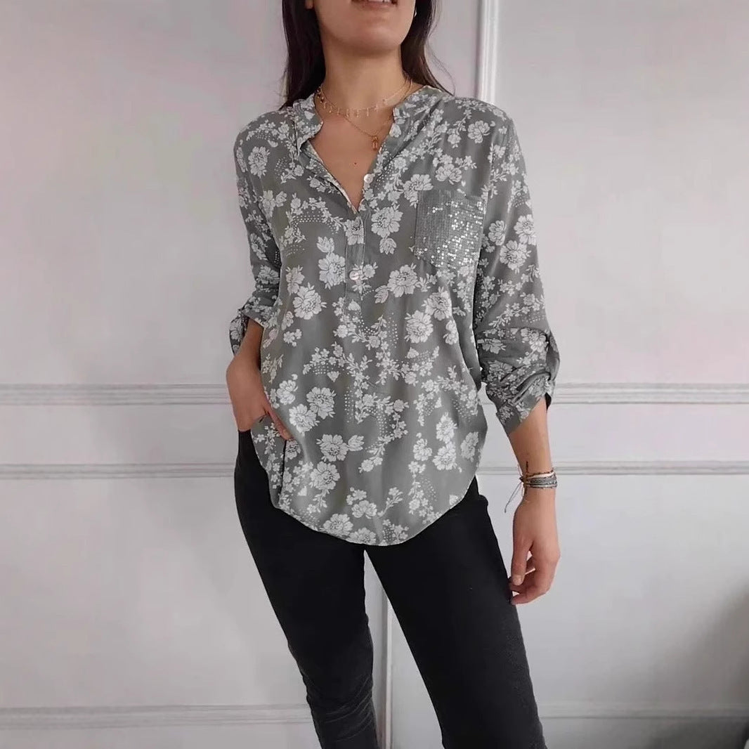Damebluse med blomstret design og glitrende accenter Stilla