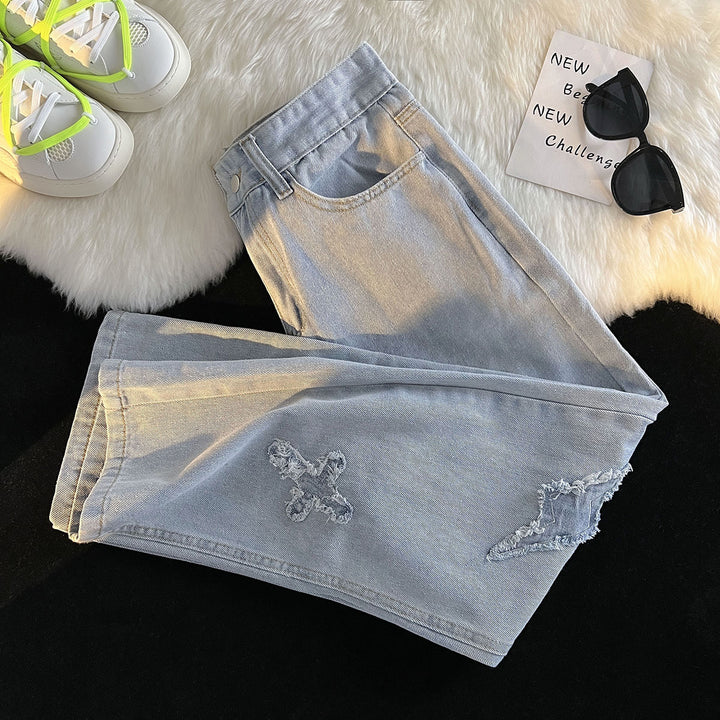 Damer løse højtaljede jeans med kreativt destroyed-design og afslappet snit Stilla