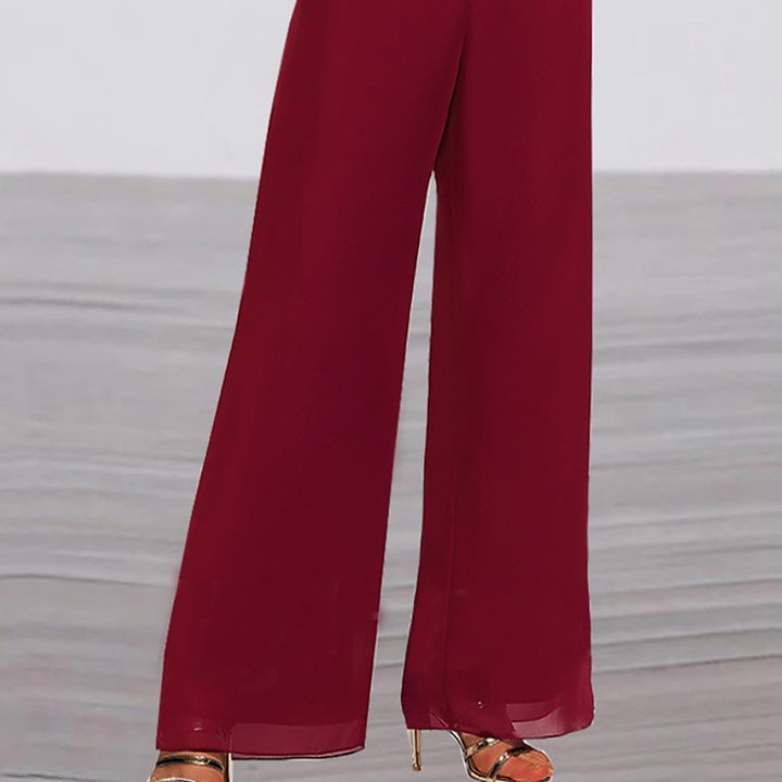 Dame elegant Jumpsuit med vidde ben og suave stropper Stilla