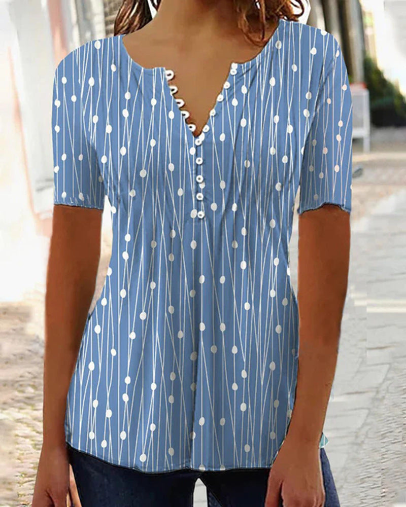 Dame kortærmet bluse med dekorativt knapdesign Stilla