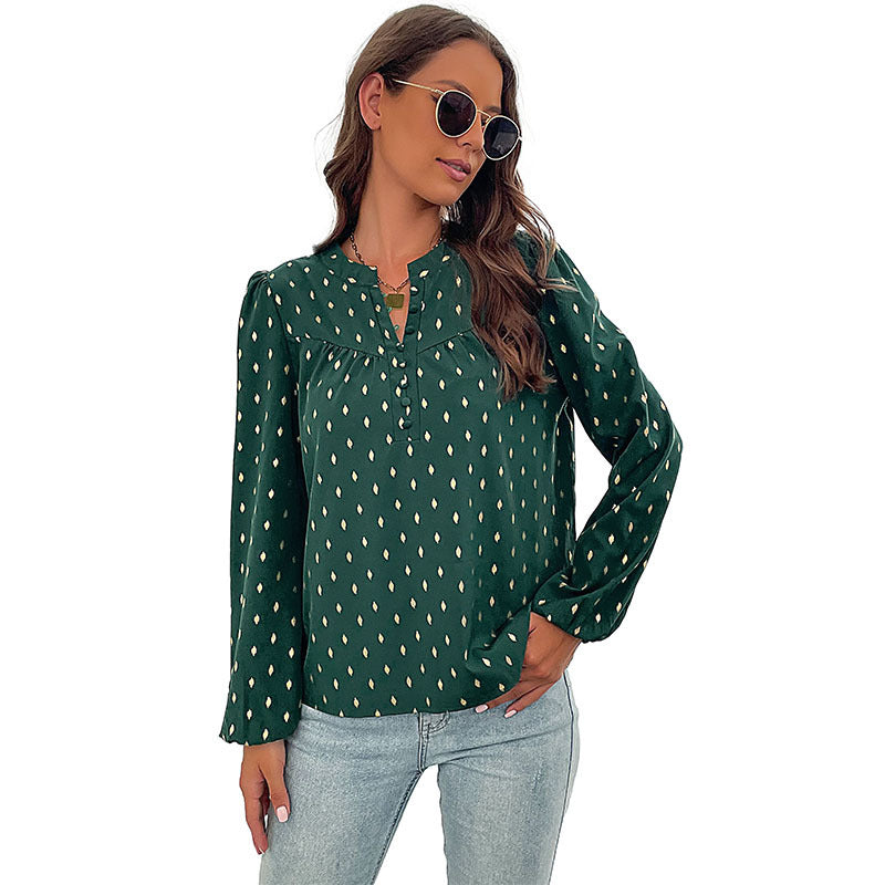 Damebluse med fint print og knapdetaljer Stilla
