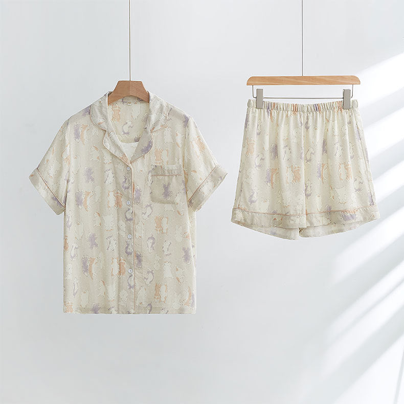 Dame kortærmet pyjamassæt med blomsterdesign og knap-til-krave Stilla