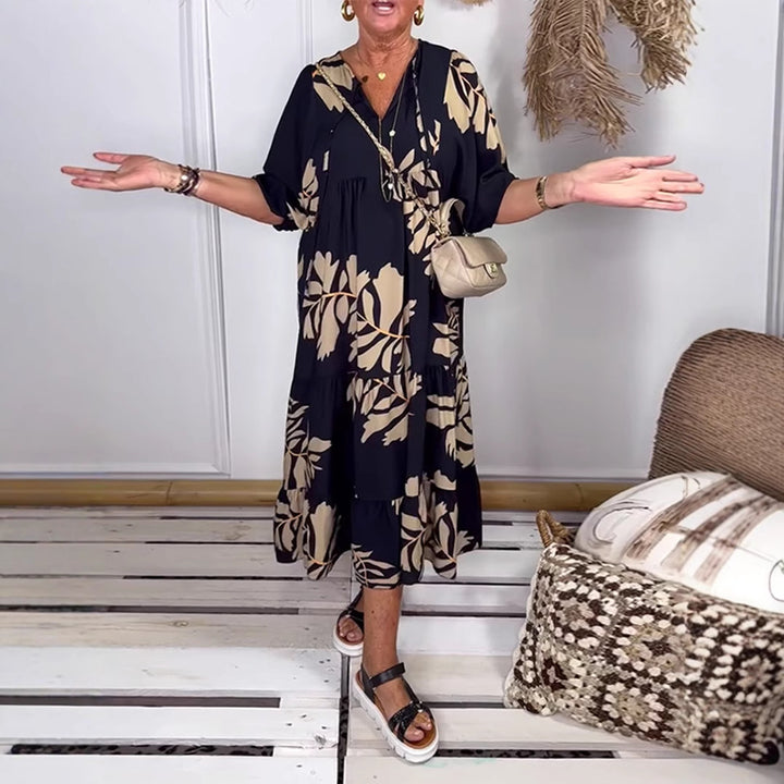 Dame maxikjole med blomsterdesign og flydende snit Stilla