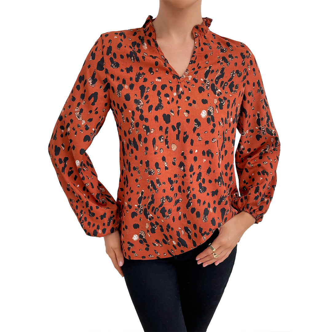 Kvinders bluse med blomsterlig leopardmønster og voluminøse ærmer Stilla