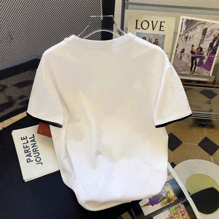 Dame T-shirt med blomstret design og løs pasform Skovae