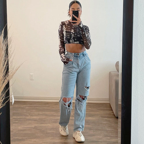 Dame Ripped Wide-Leg Jeans i en afslappet vintage-stil med frynset detaljer og høj talje Stilla