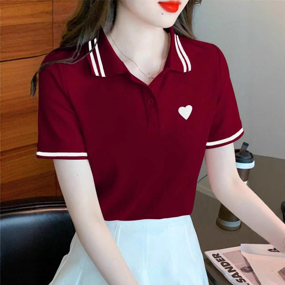 Dame Polo-shirt med fint hjertemotiv og kontrasterende striber Stilla