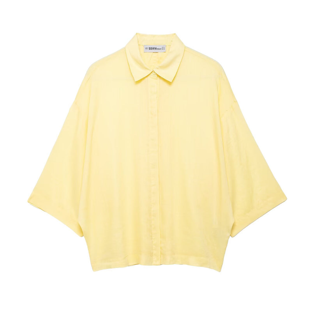 Dame Oversized-bluse med moderne snit og praktiske knapdetaljer Skovae