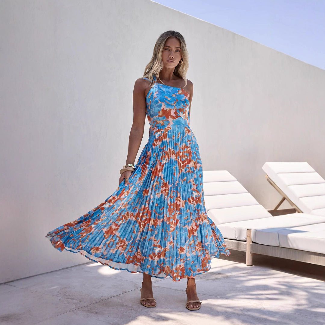 Dame maxi kjole med svingende plisseret nederdel og feminin blomsterdesign
