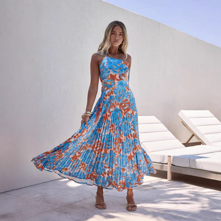 Dame maxi kjole med svingende plisseret nederdel og feminin blomsterdesign