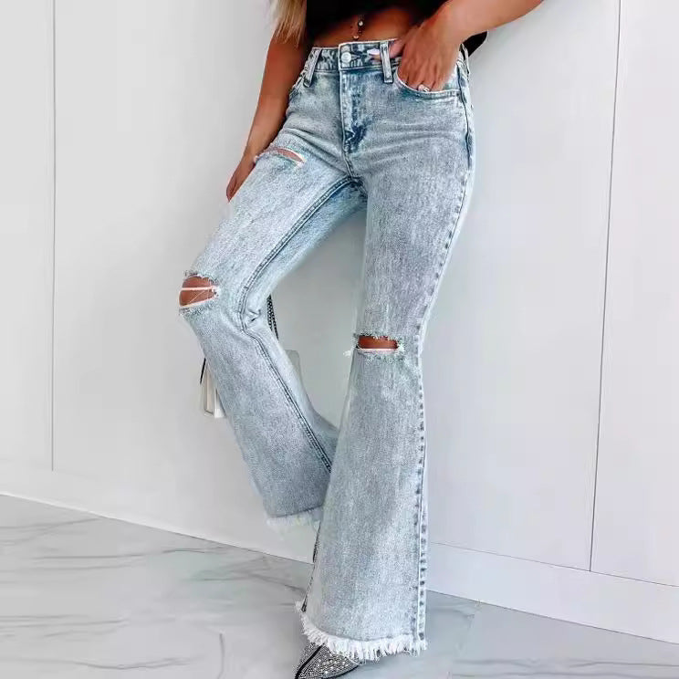 Dame flared jeans med frynset kant og moderne used-look Stilla