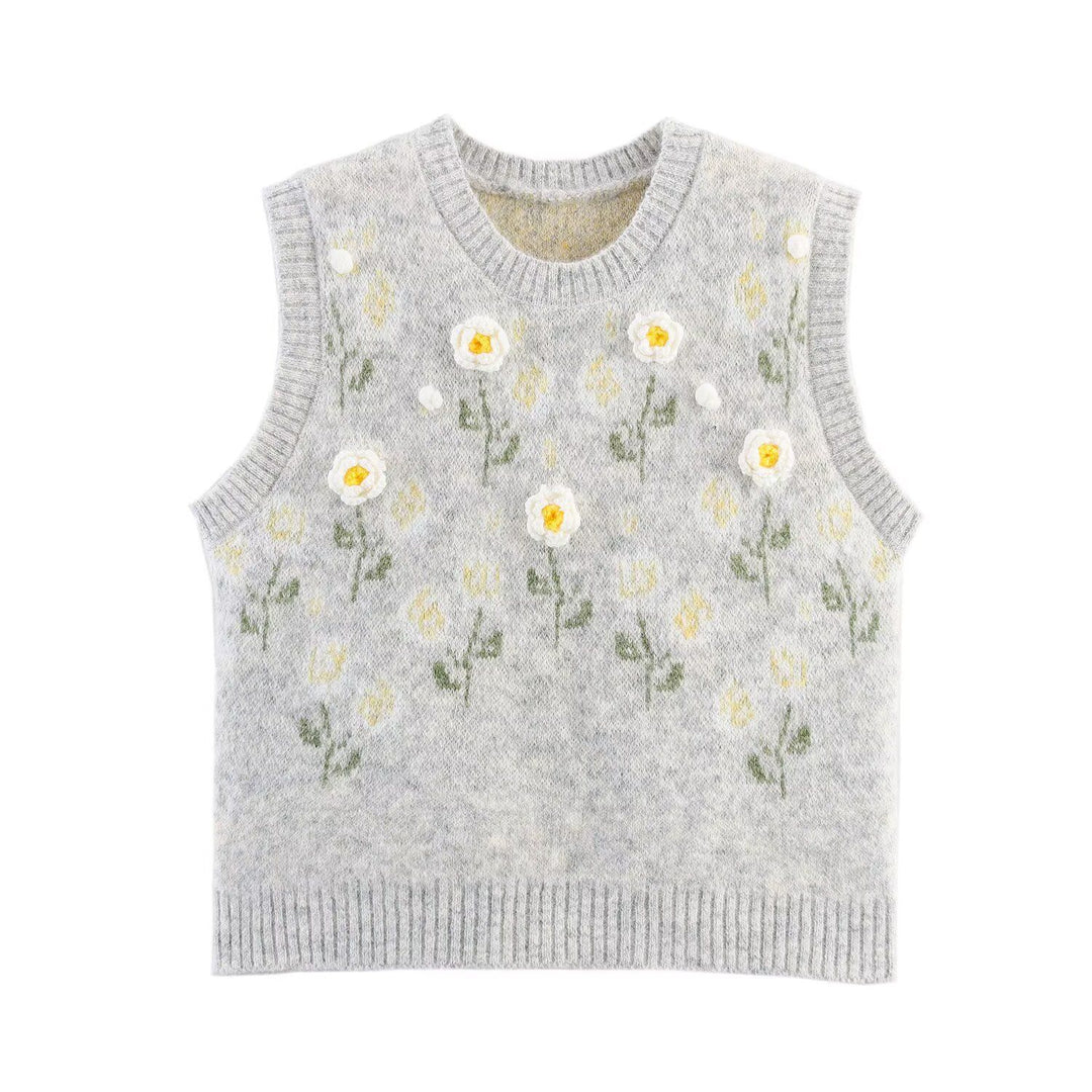 Dame strikvest med florale applikationer Stilla