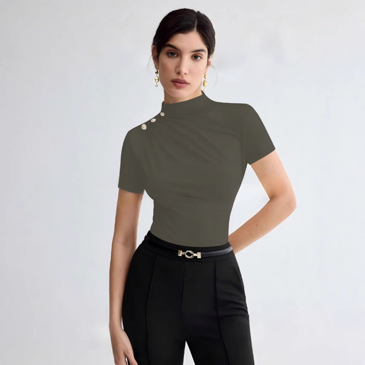 Dame elegant top med dekorative knapdetaljer og moderne ståkrave Skovae