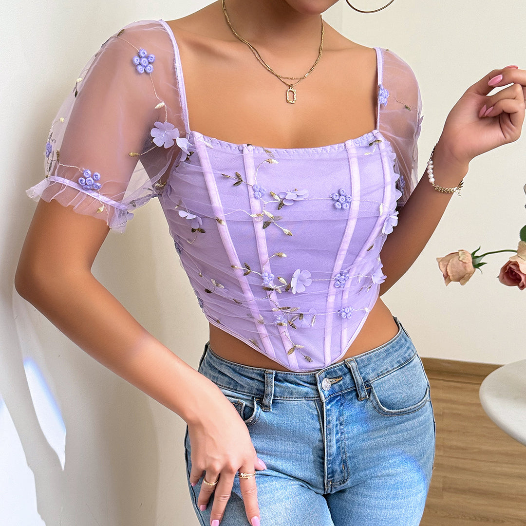 Damer elegant top med blomster-netærmer og flæsedetaljer Stilla