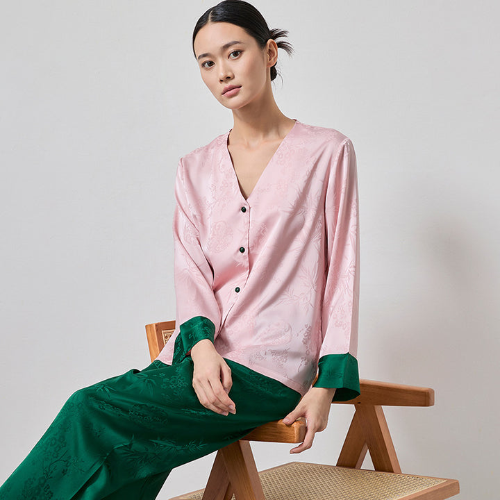 Dame Satin pyjamasæt med delikat blomsterdesign og elegante detaljer Stilla