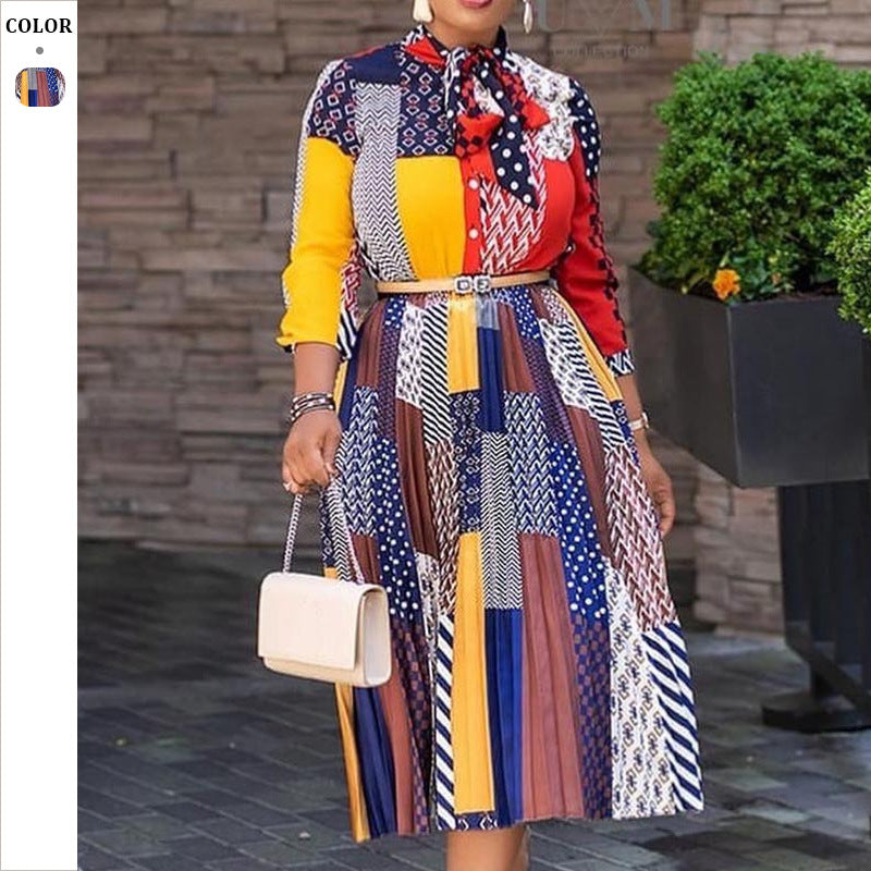 Dame Midi-kjole med farverigt patchwork-design og elegant taljebælte Stilla