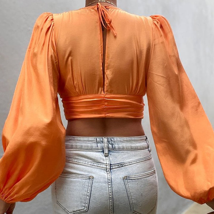 Dame Mode Bouclé-Crop-Top med pufærmer og knapdetaljer Stilla