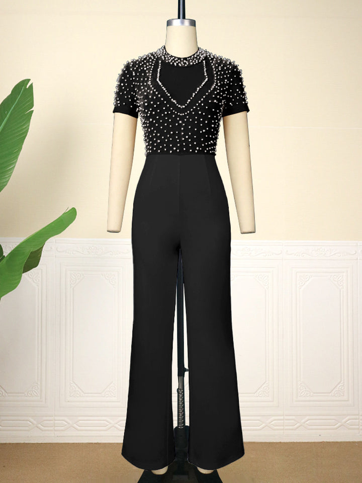 Dame elegant jumpsuit med glimrende perle detaljer Skovae