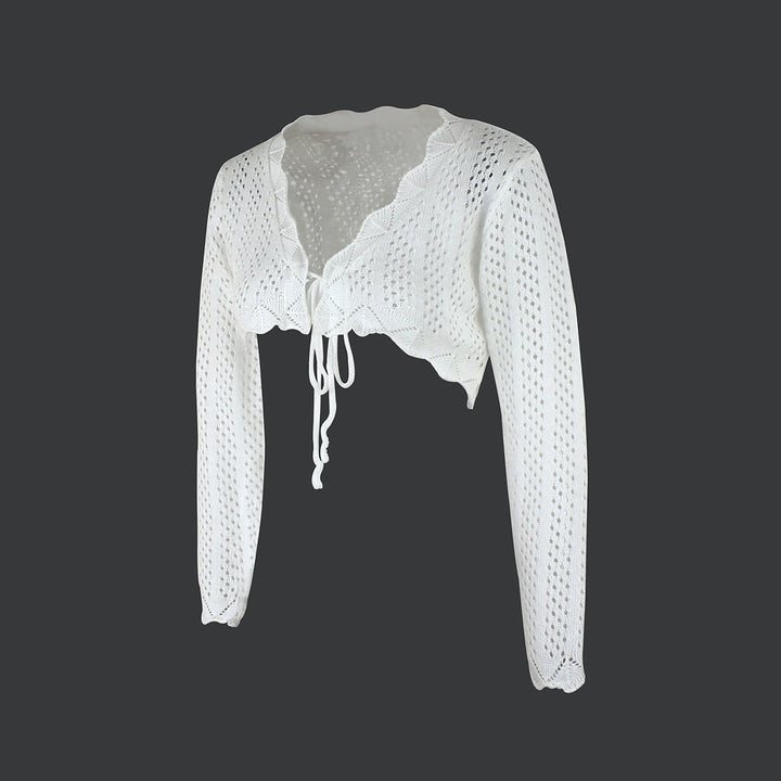 Dame cropped strikbluse med sløjfe lukning og hullet design Stilla