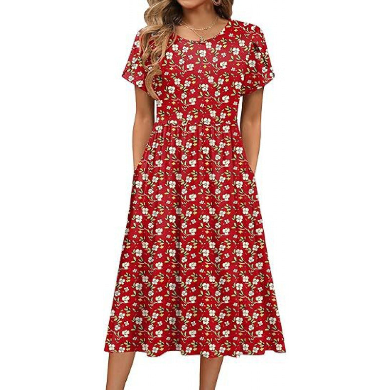 Dame flydende maxikjole med blomsterdesign og praktiske sidelommer Stilla