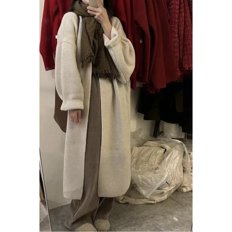 Dame lang strikjakke med oversized pasform og blødt fleecefor